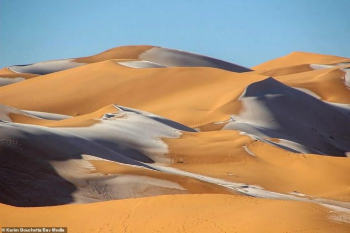 В Африке в пустыне Сахаре температура воздуха опустилась ниже ноля и выпал снег